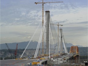 The new Port Mann Bridge under construction in June 2012, six months before its official opening. This project made financial sense in that it was the result of a proactive policy of accommodating future growth, says Keith Samshaw of the Association of Consulting Engineering Companies of B.C.