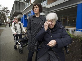 FILE PHOTO: Caroline Coutts with mother Barbara in front of Terraces' senior residences in Vancouver, B.C., March 24, 2017.