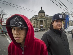 Jonathan Ewenin, left, and his brother Ian Bee at Main and Hastings in Vancouver. Traditional First Nations treatment has helped Ewenin fight a long battle with substance abuse.