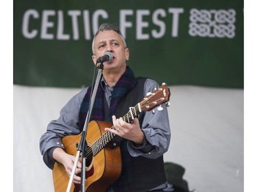 Bruce Coughlan performs at the Celtic Fest set up on Robson st to celebrate St. Patrick's Day Vancouver March 17 2017.