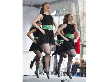 The De Danaan Dancers perform at the Celtic Fest set up on Robson st to celebrate St. Patrick's Day Vancouver March 17 2017.