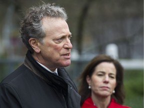 NDP MLAs George Heyman and Selina Robinson hold a news conference March 29 in Vancouver outside the Terraces on 7th Avenue, which is evicting about 20 seniors from subsidized, assisted-living suites.