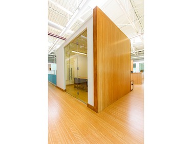 Wood Innovation The builder desired a structural floor panel made that could serve as the finished floor as well as the finished ceiling surface for the area below the mezzanine, which meant significant cost savings with a wood design compared to conventional systems.