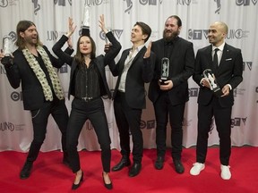 July Talk accepts the Alternative Album of the Year at the Juno Gala awards show in Ottawa, Saturday, April 1, 2017. THE CANADIAN PRESS/Adrian Wyld