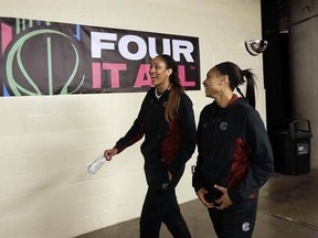 South Carolina forward A&#039;ja Wilson, left, and South Carolina guard Allisha Gray, right, walk to their locker room following a news conference at the women&#039;s Final Four college basketball tournament, Saturday, April 1, 2017, in Dallas. South Carolina will play Mississippi State on Sunday in the NCAA Championship game. (AP Photo/Eric Gay)