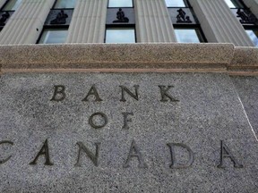 The Bank of Canada building is pictured in Ottawa on September 6, 2011. The Bank of Canada says it&#039;s detecting early signs of a &ampquot;modest&ampquot; pickup in corporate investment over the near term, even amid considerable uncertainty surrounding the U.S. economic agenda. THE CANADIAN PRESS/Sean Kilpatrick