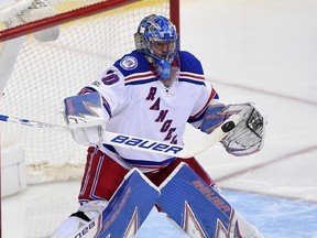 New York Rangers goalie Henrik Lundqvist (30), of Sweden, defends the net during the third period of the team&#039;s NHL hockey game against the Washington Capitals, Wednesday, April 5, 2017, in Washington. The Capitals won 2-0. (AP Photo/Nick Wass)