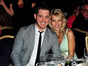 FILE - In this June 29, 2012, file photo, singer Michael Buble and his wife, Argentine TV actress Luisana Lopilato, pose at the Nordoff Robbins 02 Silver Clef Awards at London Hilton, in London. Lopilato says her and Buble&#039;s son Noah is doing &ampquot;well&ampquot; following successful cancer treatment. (Photo by Jon Furniss/Invision/AP, File)