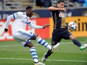 Montreal Impact midfielder Ballou Tabla, left, and Philadelphia Union midfielder Alejandro Bedoya vie for the ball during the second half of an MLS soccer match Saturday, April 22, 2017, in Chester, Pa.Tabla has turned heads in his first MLS matches with the Montreal Impact and could end up as a regular starter in the not too distant future. THE CANADIAN PRESS/AP/Michael Perez