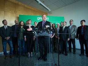 B.C. Green party leader Andrew Weaver, flanked by his Metro Vancouver candidates, talks about the party's affordable housing strategy during a Vancouver campaign stop on Tuesday.