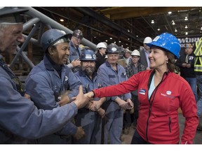 B.C. Liberal Leader Christy Clark greets workers as she tours Supreme Steel in Delta on Thursday, April 20, 2017.