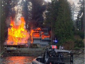 Two waterfront homes in Belcarra, B.C. are destroyed by fire on Sunday, April 9, 2017.