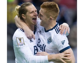 Vancouver Whitecaps' Brek Shea, left, and Tim Parker celebrate Shea's goal during first half, second leg, CONCACAF Champions League soccer semifinal action against Tigres UANL, in Vancouver, B.C., on Wednesday, April 5, 2017.