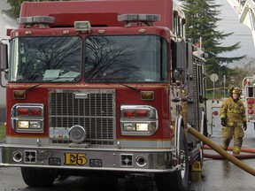 Two people were rushed to hospital, one in critical condition, following an apartment fire Monday night in Burnaby.