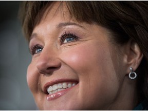 British Columbia Premier Christy Clark smiles while speaking after paying her respects during the Qingming Festival, also known as tomb-sweeping day, at Mountain View Cemetery in Vancouver, B.C., on Wednesday April 5, 2017. The traditional Chinese festival is held on the 15th day after the spring equinox to honour ancestors.
