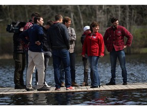 B.C. Liberal party leader Christy Clark speaks to team members of Rowing Canada at the Elk Lake boathouse in Saanich, B.C., on Tuesday, April 11. It was the first official day of the provincial election campaign.