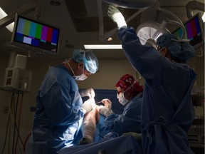 An operation at the Cambie Surgery Centre in Vancouver, one of a handful of multipurpose private surgery centres in the Lower Mainland.