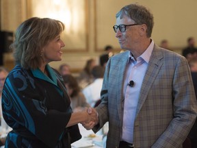 FILE PHOTO Microsoft Co-Founder, Bill Gates greets British Columbia Premier Christy Clark prior to a discussion during the Emerging Cascadia Innovation Corridor Conference in Vancouver, B.C., Tuesday, Sept. 20, 2016.