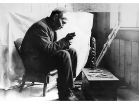 Haida carver Charles Edenshaw at work.  Undated photo from Museum of Anthropology, University of B.C.