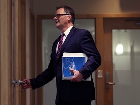 Ombudsperson Jay Chalke arrives to speak to media as he releases his report into the terminations of Ministry of Health employees in 2012 during a press conference in Victoria on Thursday, April 6, 2017.