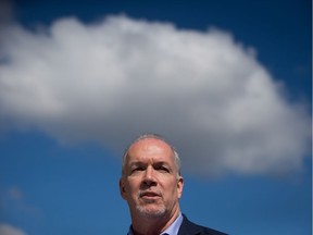 NDP Leader John Horgan on the campaign trail in Vancouver on Friday.