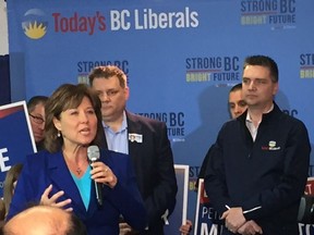 Liberal Leader Christy Clark campaigns in Kelowna. Just to the right and partly behind her is Kamloops-North Thompson candidate Peter Milobar and the next right with hands cross is Todd Stone, who is seeking re-election in Kamloops-South Thompson.