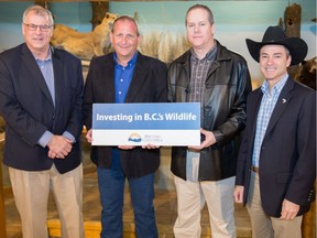 From left, Steve Thomson, minister of Forests, Lands, and Natural Resources Operations, Jim Glaicar, president of the B.C. Wildlife Federation, Scott Ellis, executive-director of the Guide Outfitters Association of B.C., and Norm Letnick, minister of Agriculture, at a news conference in March 2017 announcing a new agency to handle wildlife management funds from hunting fees.