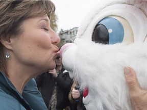 Liberal leader Christy Clark kisses the Easter bunny on the nose during a campaign stop in Comox, B.C. Monday, April 17, 2017.