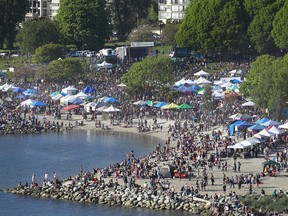 Thousands gathered at 4/20 celebrations on Second Beach in 2016, the first it was moved away from the Vancouver Art Gallery.