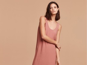 Pink has become an it hue — for guys and girls, alike. A model wears the Jonkman dress from Wilfred Free, $75 at Aritzia.