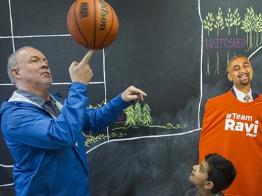 B.C. NDP Leader John Horgan visits Ravi Kahlon constituency seen here with Kahlon's son Naven age 6 in North Delta, B.C., April 10, 2017.