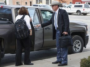 Texas Ranger Nick Hanna, right, arrives to testify at the trial of Winston Blackmore and James Oler, who are both accused of practising polygamy in a fundamentalist religious community, in Cranbrook, B.C., Tuesday, April 18, 2017.