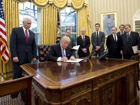 In January, U.S. President Donald Trump signed an executive order banning federal funding for overseas abortions. No women were present.