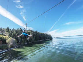 Camp Qwanoes added the ‘Jet Stream’ in 2016 for their 50th anniversary. Campers soar side by side from the land to the sea on 1,000-foot-long ziplines - ending at the "Beach Port” in the Aqua Park.