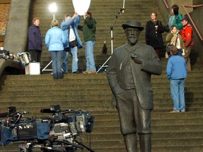 The trial of accused mass-murderer William Robert Pickton began on Jan. 30, 2006, at New Westminster provincial court. Pictured is a statue of Sir Matthew Begbie, 'The Hanging Judge,' surrounded by the media at the courthouse.