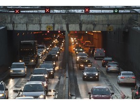 Morning traffic flows in and out of the George Massey Tunnel in Richmond earlier this year. Protesters disrupted a ground-breaking ceremony on Wednesday as the B.C. Liberals look to replace the tunnel with an estimated $3.5 billion, 10-lane toll bridge.