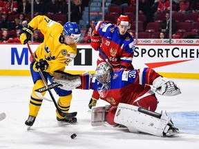 Goaltender Ilya Samsonov of Team Russia tries to stop Jonathan Dahlen of Team Sweden during the 2017 IIHF World Junior Championship bronze medal game at the Bell Centre on Jan. 5, 2017, in Montreal.