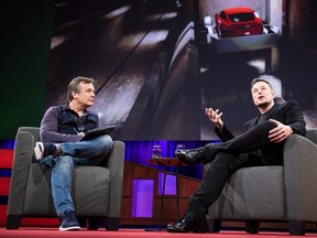 TED Talks curator Chris Anderson, left, interviews Tesla founder and tech visionary Elon Musk on Friday in Vancouver.