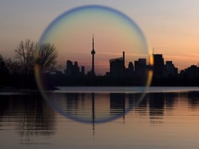 The Toronto skyline, through the ‘lens’ of a soap bubble. Global luxury home sales cooled off in 2016 for the second consecutive year, even with a record number of homes selling for more than $100 million.