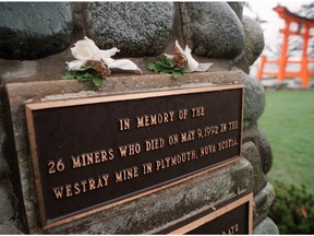 Two corsages placed on a cairn in Campbell River where two men died in the Quinsam Coal Mine accident. The cairn is a tribute to the men that died in the Westray mine accident in 1992.