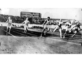 Percy Williams wins the 100 metre race at the 1928 Olympics in Amsterdam.