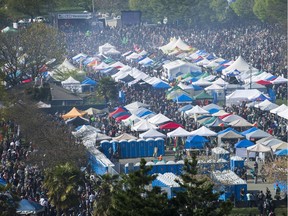 A cloud of pot smoke hangs over the annual 4/20 event at Sunset Beach in Vancouver.