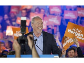 John Horgan speaks at an NDP rally at the Commodore Ballroom in Vancouver on Sunday.