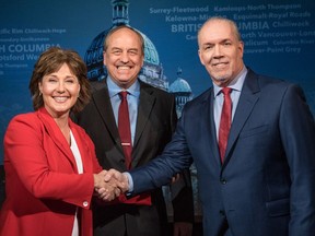 From left, B.C. Liberal Leader Christy Clark, Green party Leader Andrew Weaver and NDP Leader John Horgan pose before the televised leaders debate on April 26, 2017.