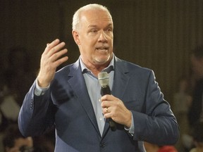 B.C. NDP Leader John Horgan leads a rally in Vancouver on April 11, 2017.
