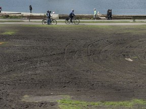 Damaged lawns at Sunset Beach in Vancouver, BC Friday, April 21, 2017 attest to the tens of thousands who attended the annual 420 marijuana event held on the field the day before.