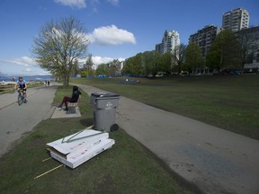 Damaged lawns at Sunset Beach in Vancouver, BC Friday, April 21, 2017 attest to the tens of thousands who attended the annual 420 marijuana event held on the field the day before.