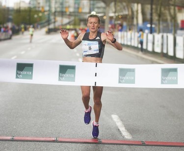 Karolina Jarzynska-Nadolska finished first in women's as about 40,000 runners competed in 2017 Vancouver Sun Run in Vancouver, B.C., April 23, 2017.