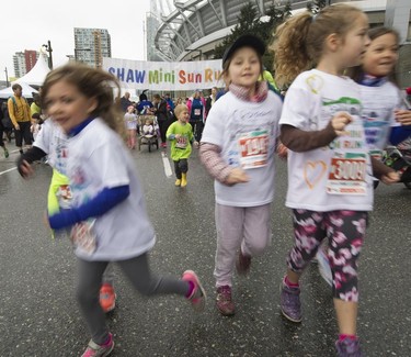 Kids compete in the Shaw Mini Sun Run before 40,000 competitors competed in 2017 Vancouver Sun Run in Vancouver, B.C., April 23, 2017.