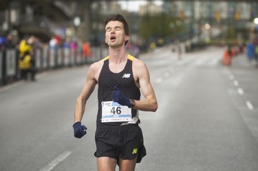 Speed walker Benjamin Thorne crosses the finish line about 40,000 runners competed in 2017 Vancouver Sun Run in Vancouver, B.C., April 23, 2017.